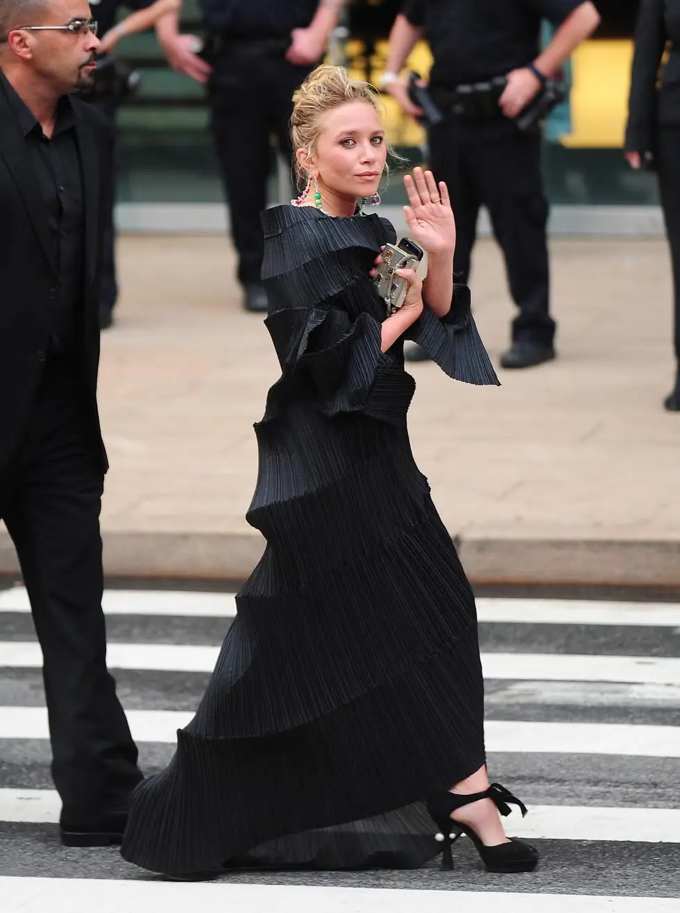 玛丽-凯特·奥尔森在2013年 CFDA 大奖上,身着“Issey Miyake(三宅一生)”的衣服